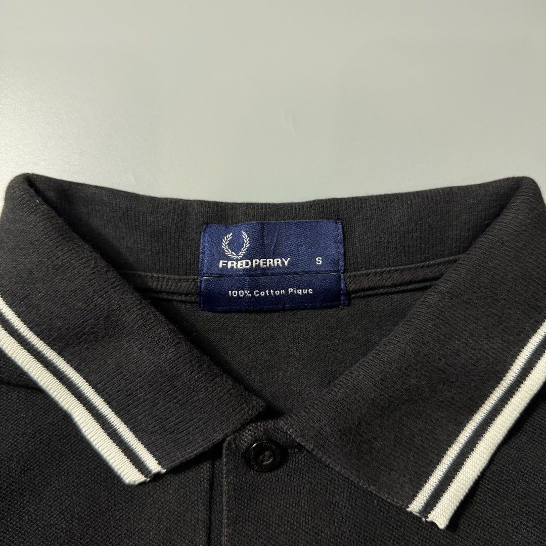 Fred Perry Black Polo Shirt (Category: Tshirts & Polo Shirts ) located in Dagupan City. Submitted by dgp.plvg (Listing ID 1458731002, Image 3). Description: VINTAGE FRED PERRY POLO SHIRT Size: Small Width: 18” Length: 26” Condition: Good Issues: signs of usage only Mine: ₱1,500.