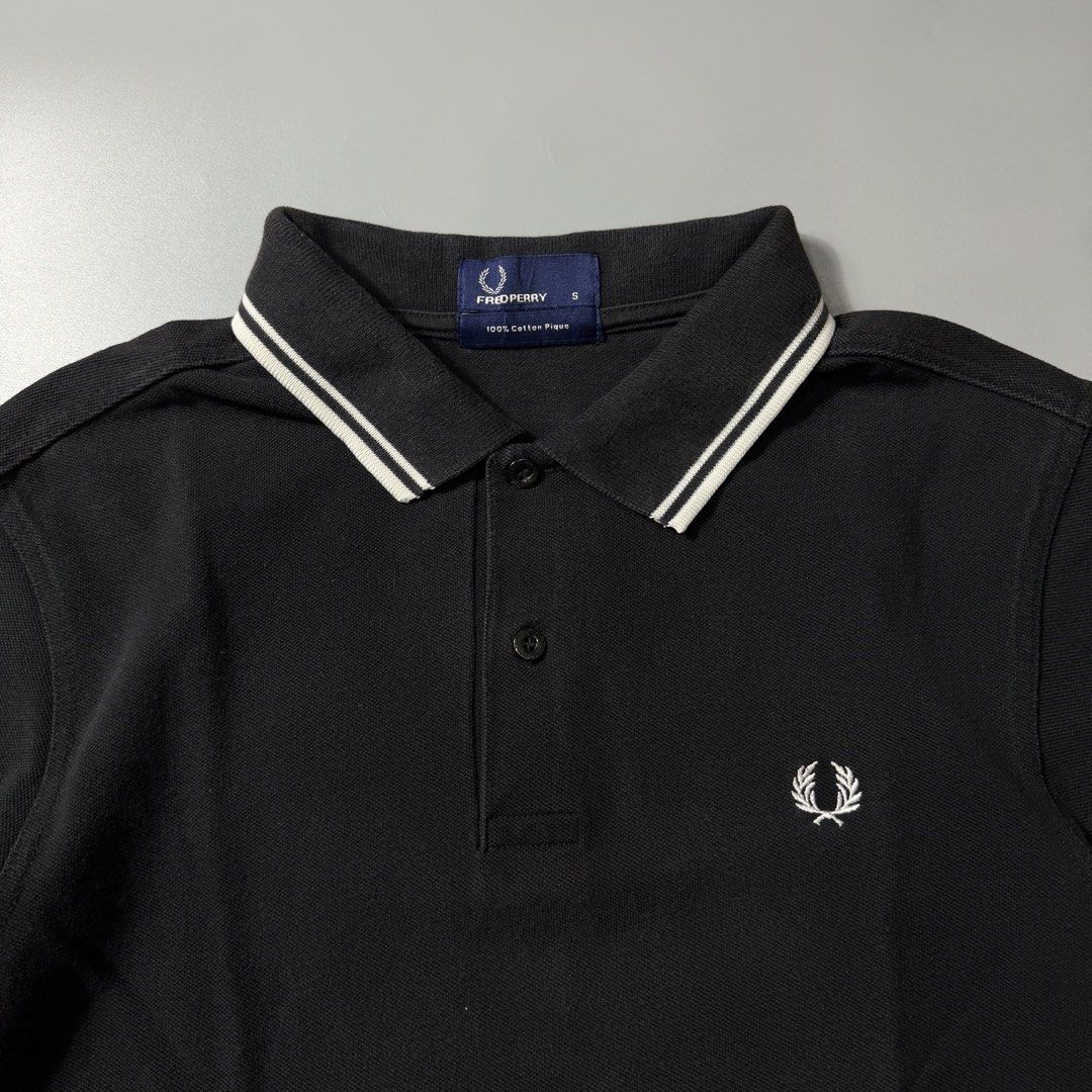 Fred Perry Black Polo Shirt (Category: Tshirts & Polo Shirts ) located in Dagupan City. Submitted by dgp.plvg (Listing ID 1458731002, Image 2). Description: VINTAGE FRED PERRY POLO SHIRT Size: Small Width: 18” Length: 26” Condition: Good Issues: signs of usage only Mine: ₱1,500.