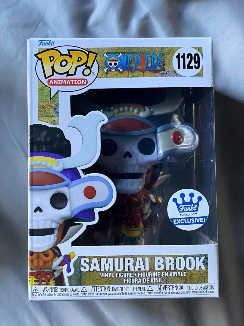 Funko Pop Animation One Piece Samurai Brook #1129 Exclusive (Category: Figurines & Statues) located in Angeles City. Submitted by rickki_t (Listing ID 1458841161, Image 1). Description: - Funko Pop! Animation Figure - Character: Samurai Brook - Series Number: 1129 - Exclusive: Funko.com Exclusive - Perfect for One Piece collectors - Box condition: Good.