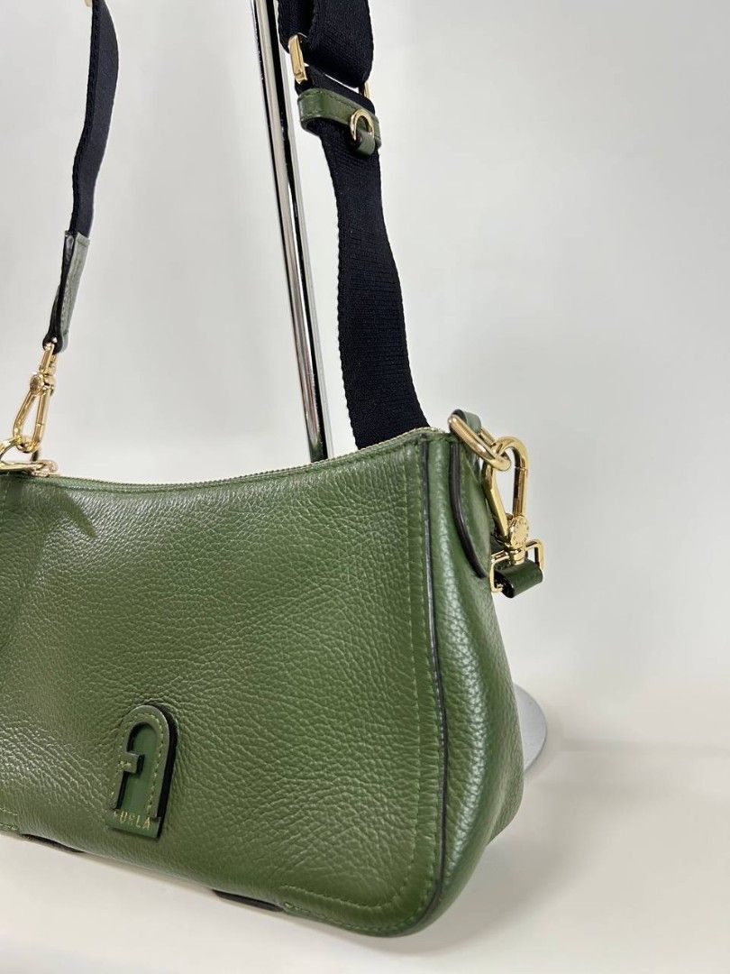 Furla Atenna Crossbody bag (Category: Luxury Bags & Wallets) located in Quezon City. Submitted by cornelle_luxuryph (Listing ID 1458808680, Image 3). Description: Fürla Atena crossbody bag With olive green textured leather Condition: 9/10, Excellent Dimension: 19 cm (width) x 13 cm (height) x 4 cm (depth) Price: 7,8000 pesos only + optional legitgrails certificate of authenticity for 1,300 pesos only 100% authentic | Money back guarantee ⚠️ Discl