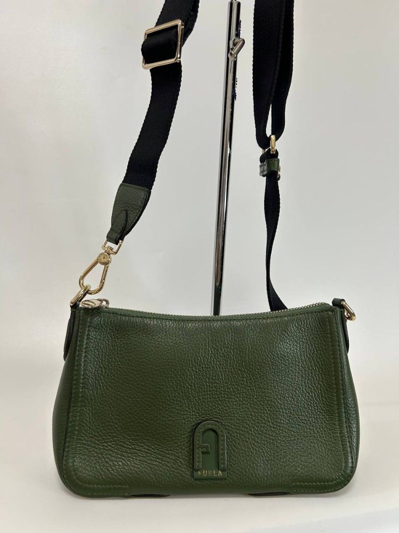 Furla Atenna Crossbody bag (Category: Luxury Bags & Wallets) located in Quezon City. Submitted by cornelle_luxuryph (Listing ID 1458808680, Image 1). Description: Fürla Atena crossbody bag With olive green textured leather Condition: 9/10, Excellent Dimension: 19 cm (width) x 13 cm (height) x 4 cm (depth) Price: 7,8000 pesos only + optional legitgrails certificate of authenticity for 1,300 pesos only 100% authentic | Money back guarantee ⚠️ Discl