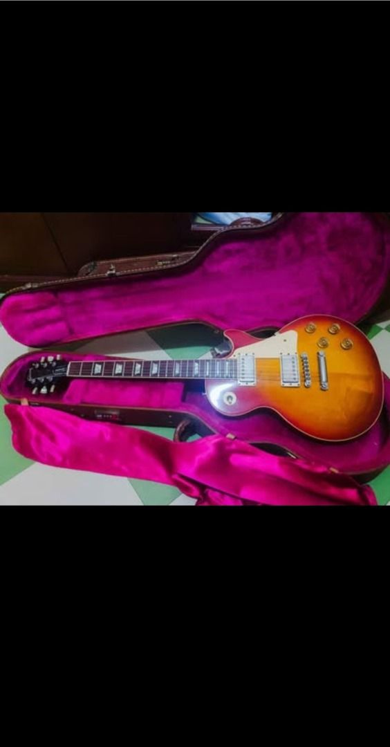 Gibson Les Paul Standard 1992 Sunburst with Case (Category: Musical Instruments) located in Quezon City. Submitted by boom76 (Listing ID 1458827738, Image 2). Description: - Gibson Les Paul Standard 1992 - Classic Sunburst Finish - Made in USA - Serial Number: 91002792 - Includes Plush Pink Lined Hard Case - Ideal for Musicians and Collectors - Ready for its New Home.
