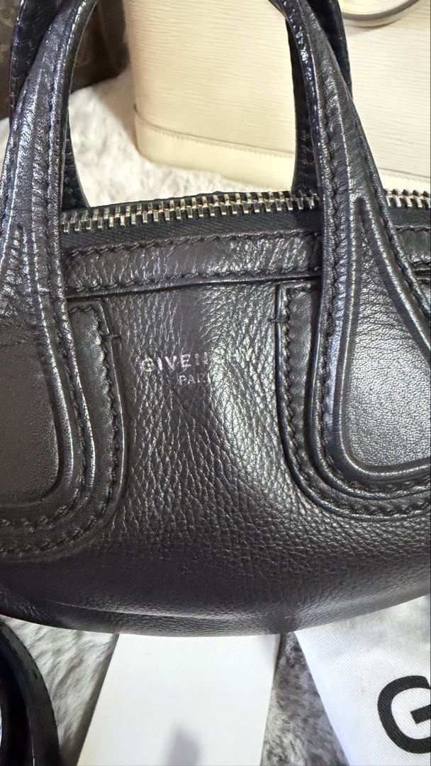 Givenchy Black Leather Mini nightangle (Category: Luxury Bags & Wallets) located in Angono. Submitted by sam.sam15 (Listing ID 1458704821, Image 3). Description: - Authentic Givenchy Mini Pandora Bag - Color: Black - Material: Pebbled Leather - Closure: Zipper - Includes: Adjustable shoulder strap, dust bag, authenticity card - Versatile: Ideal for everyday or evening use.