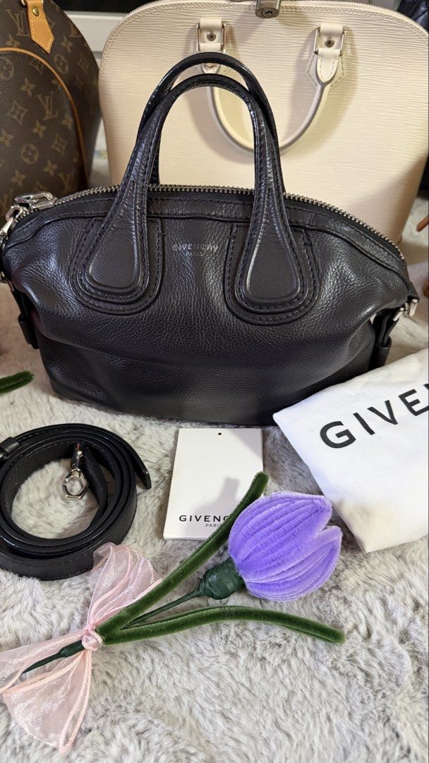 Givenchy Black Leather Mini nightangle (Category: Luxury Bags & Wallets) located in Angono. Submitted by sam.sam15 (Listing ID 1458704821, Image 2). Description: - Authentic Givenchy Mini Pandora Bag - Color: Black - Material: Pebbled Leather - Closure: Zipper - Includes: Adjustable shoulder strap, dust bag, authenticity card - Versatile: Ideal for everyday or evening use.