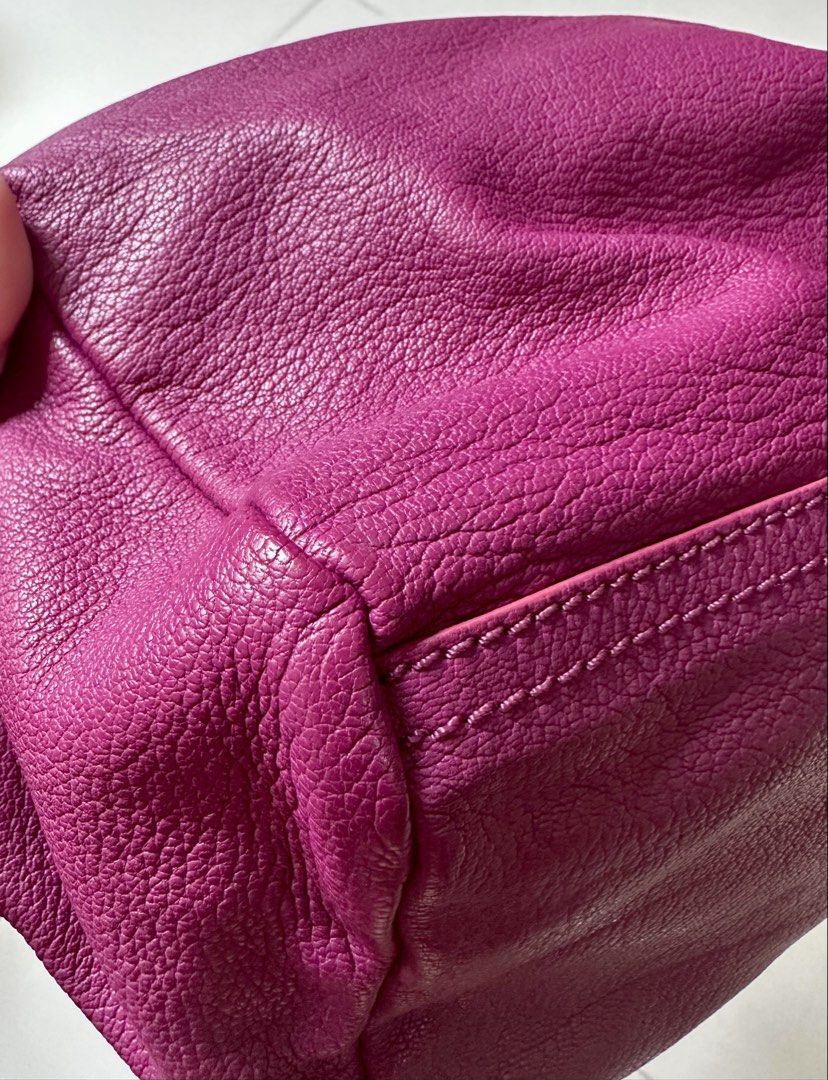 Givenchy Pandora small (Category: Luxury Bags & Wallets) located in Cebu City. Submitted by theshopforpreloved (Listing ID 1458732826, Image 3). Description: - Authentic Givenchy Pandora size small with long strap - Made in Italy - Vibrant purple leather - Features zippers - no inclusions -no flaws, damage, holes or tear -no odor .