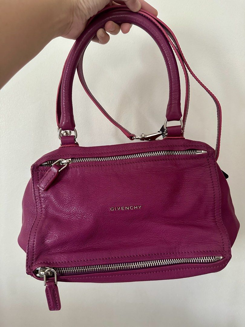 Givenchy Pandora small (Category: Luxury Bags & Wallets) located in Cebu City. Submitted by theshopforpreloved (Listing ID 1458732826, Image 2). Description: - Authentic Givenchy Pandora size small with long strap - Made in Italy - Vibrant purple leather - Features zippers - no inclusions -no flaws, damage, holes or tear -no odor .