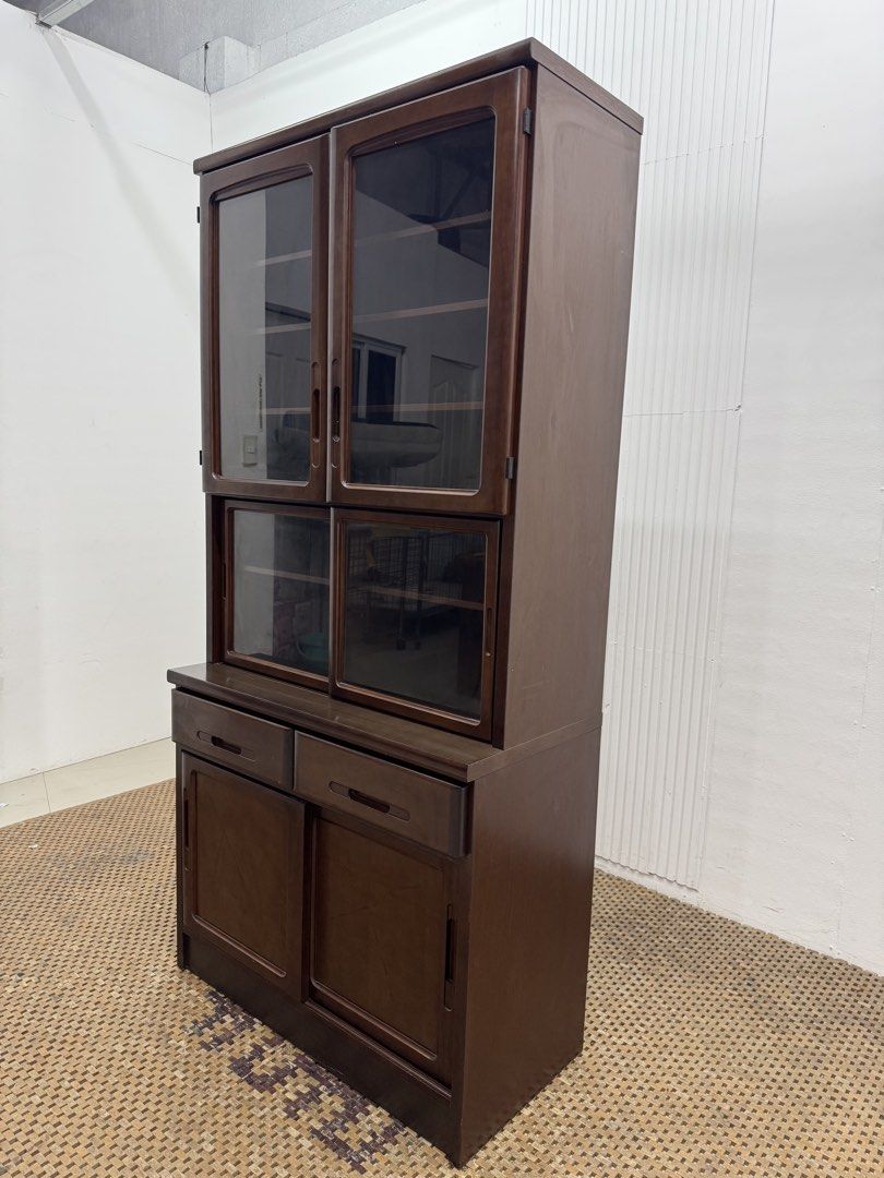 Glass sliding display cabinet (Category: Shelves, Cabinets & Racks) located in Quezon City. Submitted by matetdevis13 (Listing ID 1458750352, Image 3). Description: Classic Wallnut Display Cabinet with Sliding Glass Door Price: 7,500 L35 x W14.5 x H73.5 In good condition Code JMD30-M88.