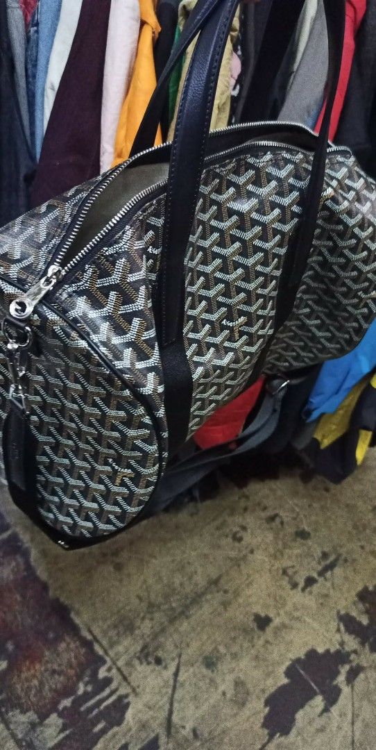 Goyard St. Louis PM Duffel Bag (Category: Luxury Bags & Wallets) located in Baguio. Submitted by XycerlynCLXN (Listing ID 1458802812, Image 3). Description: - Classic Goyard duffel bag - Iconic all-over print - Leather trim and handles - Zipper closure - Detachable shoulder strap included - Ideal for weekend trips or carry-on luggage - Spacious interior.