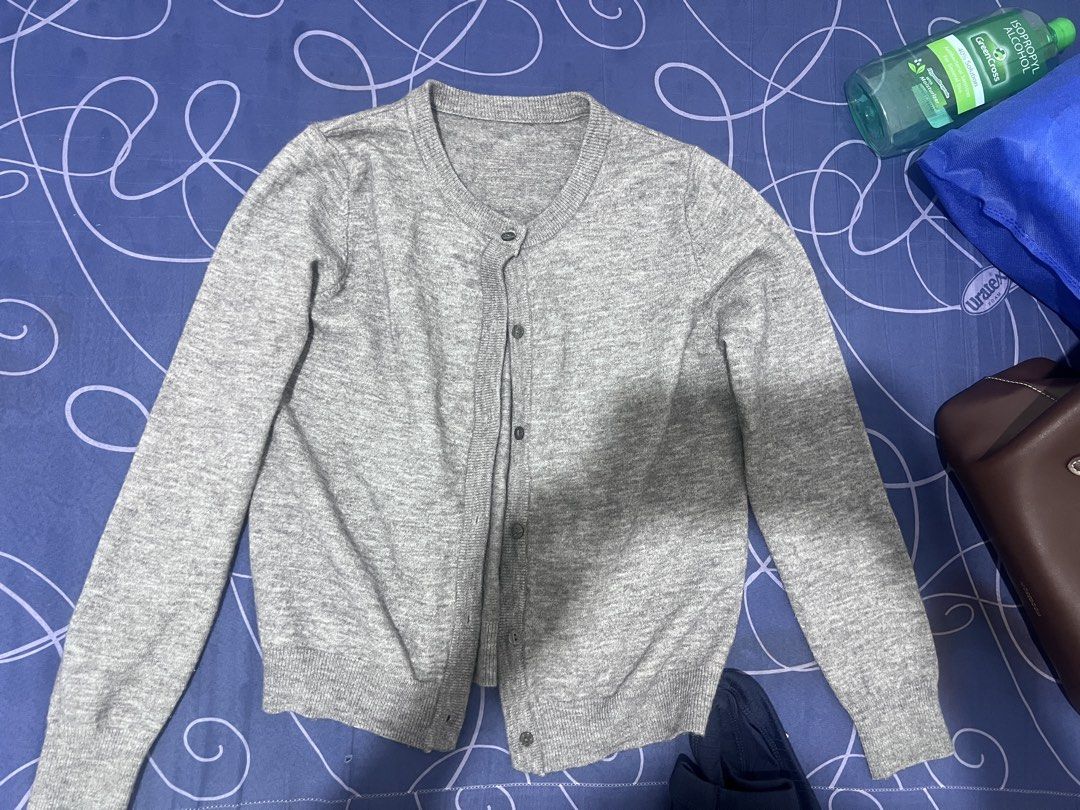 Grey Button-Up Cardigan (Category: Coats, Jackets and Outerwear) located in Cuyapo. Submitted by wisebear-42d2 (Listing ID 1458735974, Image 1). Description: 600 orig price - Simple grey cardigan - Long sleeves - Button-up front - Crew neck style - Ideal for layering over tops - Easy to match with any outfit - Great for casual wear.