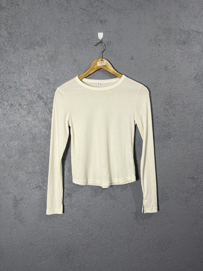 GU Ribbed Long Sleeve Top - Cream - Size S (Category: Longsleeves) located in Famy. Submitted by basicthrifted (Listing ID 1458727725, Image 1). Description: - Cream colored ribbed long sleeve top - Brand: GU - Style: Crew neck - Versatile piece, great for layering - Size: S - Made in China.
