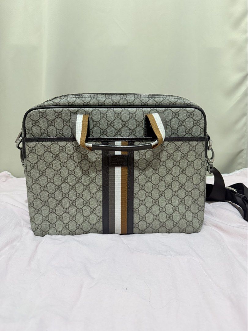 Gućcì Laptop Bag (Category: Tote Bags) located in Paranaque City. Submitted by debonair02 (Listing ID 1458710686, Image 1). Description: GUCCÌ Laptop Bag (Not Orig) to those na gusto parin ng Classy tignan Thrift in Korea Flaws: ✅Genuine Leather (No issue sa leather) ✅Hardwares: slightly Faded ✅Complete with sling 💰MARKET VALUE: Bought ₱3,500 ❌BAWAL SA MASELAN PM SURE BUYER ONLY! .