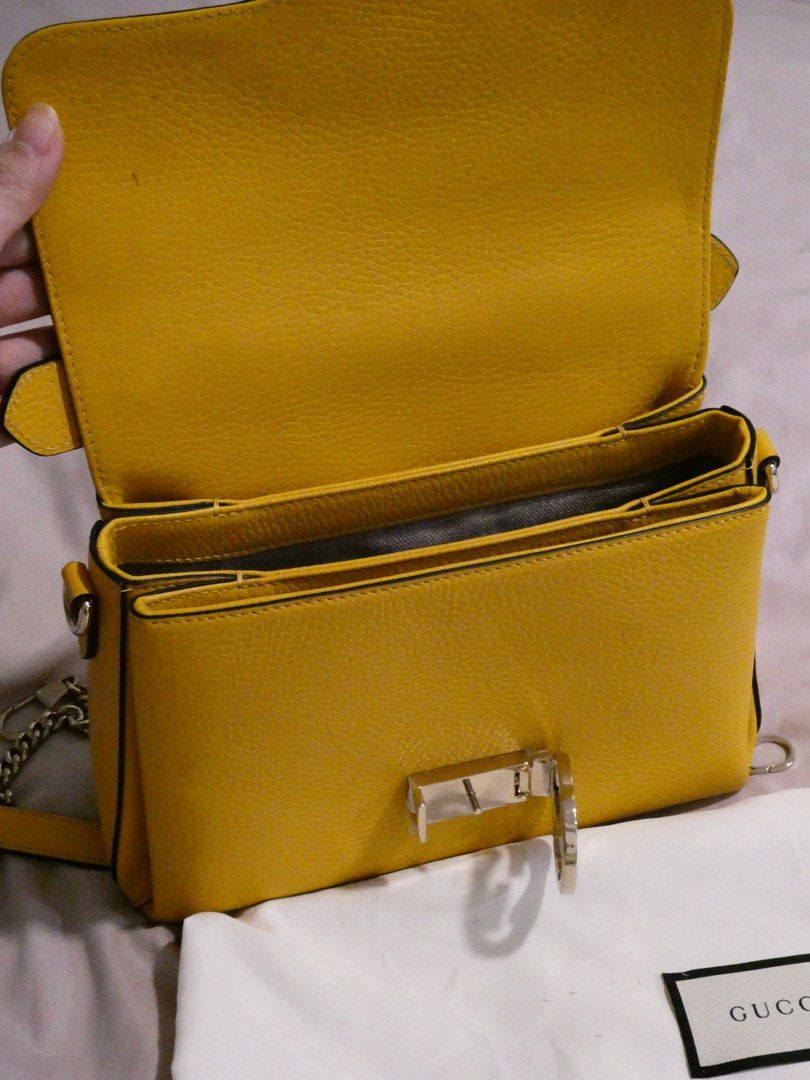 Gucci Interlocking Bag (Category: Luxury Bags & Wallets) located in Quezon City. Submitted by shopwithfrance (Listing ID 1458802504, Image 3). Description: Banana Yellow Gucci Interlocking Bag New and stored Personally bought in France Gucci outlet for ₱85,000 Comes with dust-bag, box, authenticity pamphlets/cards, receipt..