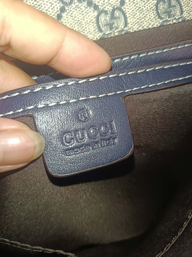 Gucci Monogram Messenger Bag (Category: Luxury Bags & Wallets) located in Bolinao. Submitted by shayne_0215 (Listing ID 1458844175, Image 2). Description: - Coded Gucci messenger bag - Classic GG monogram canvas - Navy blue leather trim - Iconic Gucci buckle closure - Great for daily use - Free Shipping Nationwide - Deal Now, Pay Now via GCASH - Helping a friend.