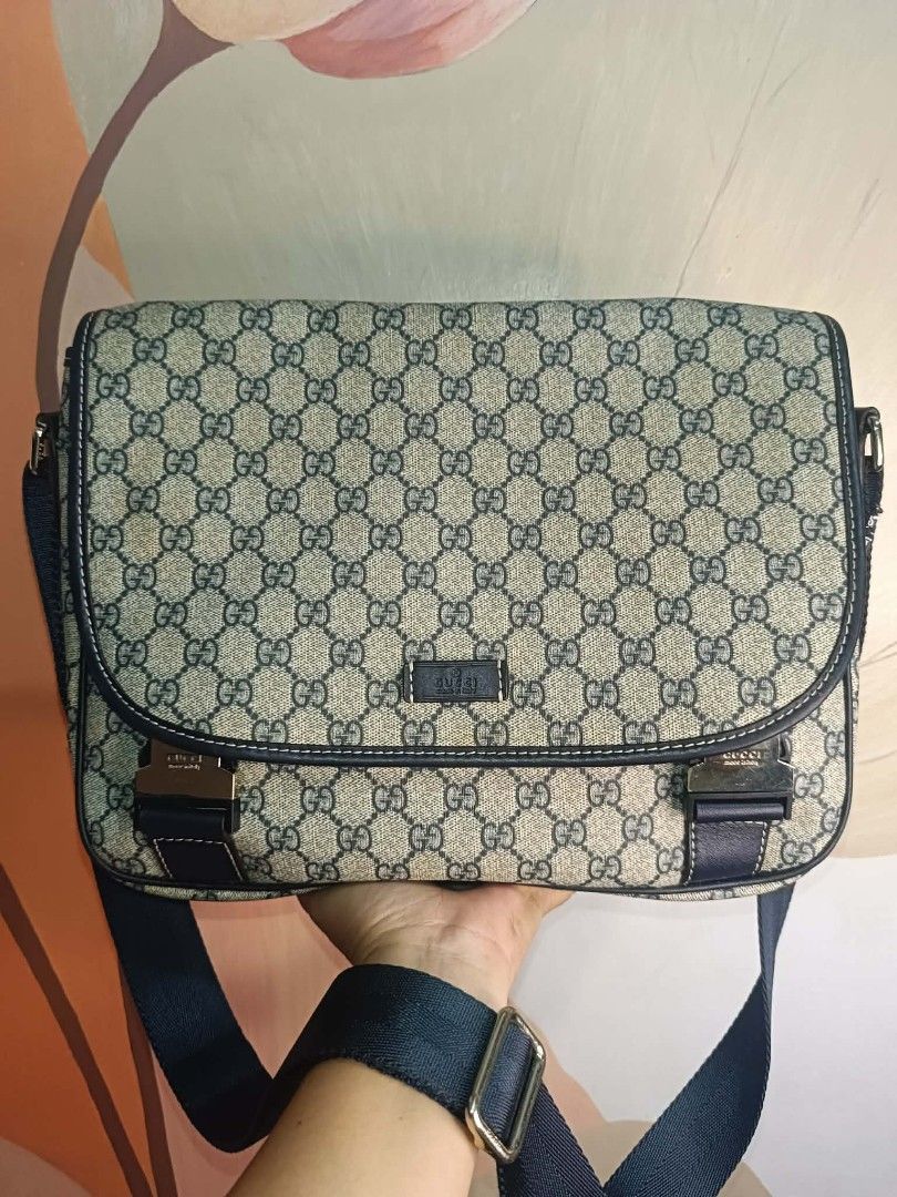 Gucci Monogram Messenger Bag (Category: Luxury Bags & Wallets) located in Bolinao. Submitted by shayne_0215 (Listing ID 1458844175, Image 1). Description: - Coded Gucci messenger bag - Classic GG monogram canvas - Navy blue leather trim - Iconic Gucci buckle closure - Great for daily use - Free Shipping Nationwide - Deal Now, Pay Now via GCASH - Helping a friend.