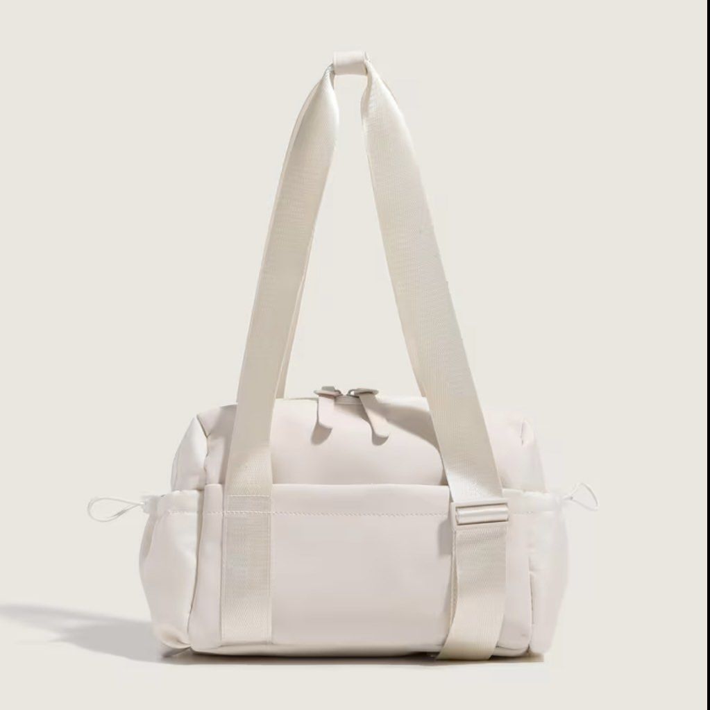Gym White Shoulder Bag (Category: Shoulder Bags) located in Bulacan. Submitted by erinbtrc (Listing ID 1458857431, Image 1). Description: 10/10 Condition Color White Never been used No Flaws/Issues Can do Same Day Delivery (Lalamove) along Metro Manila or J&T Delivery.
