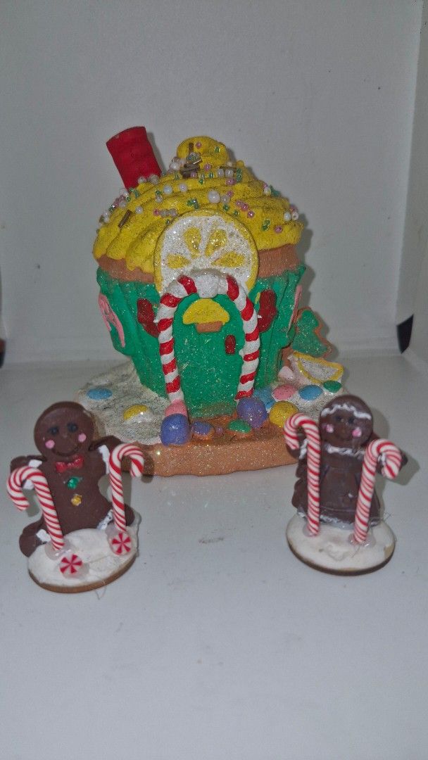 Gingerbread House Christmas Decor with Gingerbread Men (Category: Other Home Decor) located in Quezon City. Submitted by belikabim2014 (Listing ID 1458691597, Image 2). Description: - buy 3 complete sets p750.00 bundle price - Adorable gingerbread house, perfect for Christmas! - Features charming gingerbread man and womsn out front with candy canes. - Decorated with sparkling glitter, colorful candy, and detailed frosting. - Ideal for festive hol