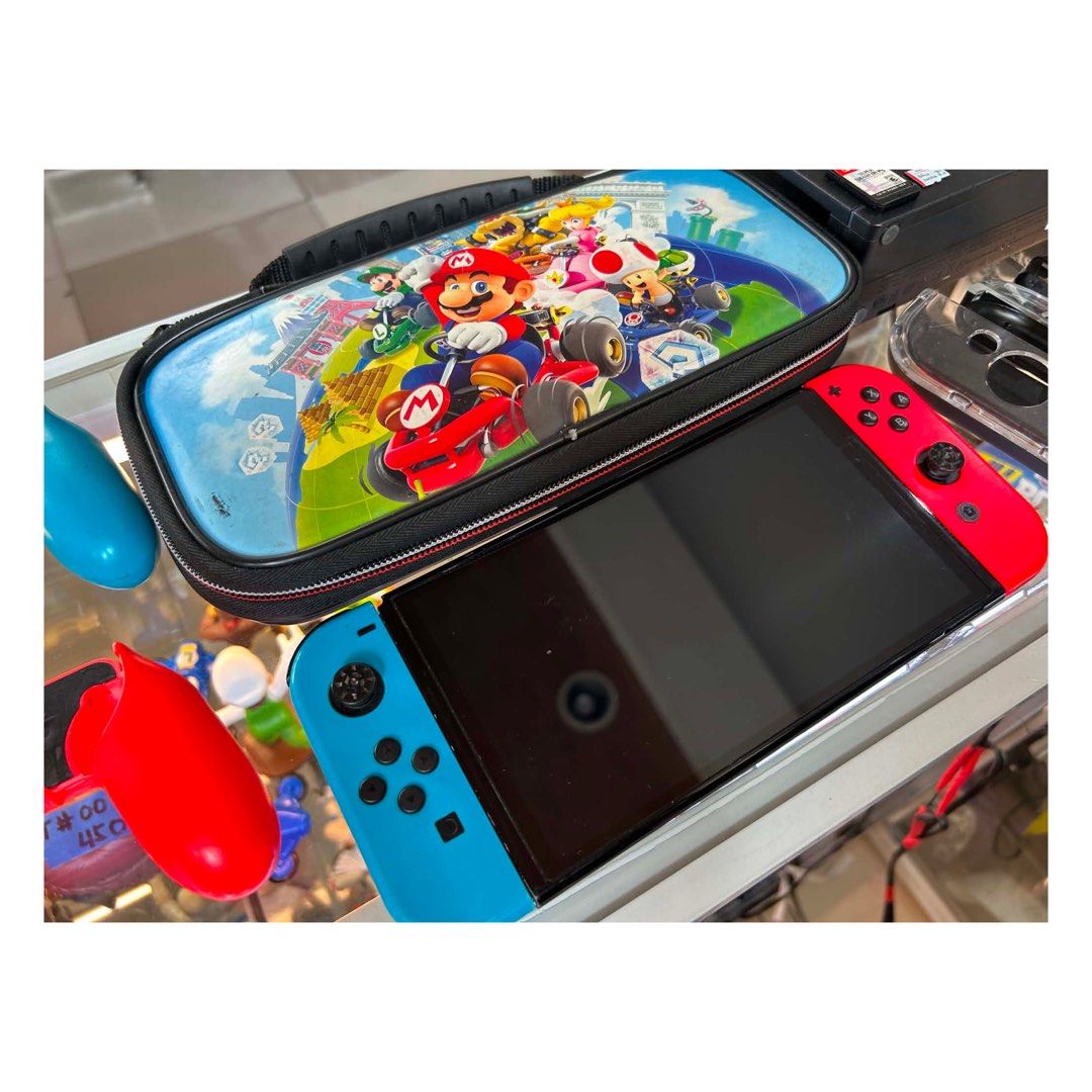 HEG-001 Nintendo Switch – OLED Model (Category: Nintendo) located in Pasig City. Submitted by califinestcollectibles (Listing ID 1458738216, Image 3). Description: HEG-001 Nintendo Switch – OLED Model. 📦 INCLUSIONS: ✅ Nintendo Switch OLED Console ✅ Neon Red & Blue Joy-Con Controllers ✅ Original Nintendo Switch Dock ✅ Original AC Adapter/Charger ✅ Joy-Con Grip ✅ Joy-Con Straps ✅ Protective Nintendo-themed Carrying Case ✅ microSD Card ✅ Extra thum
