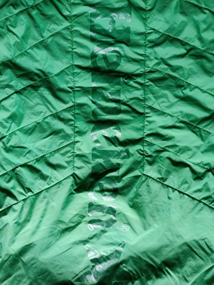 Heineken Puffer Vest (Category: Activewear) located in Rizal. Submitted by 2flyygallery (Listing ID 1458876708, Image 3). Description: 21.5x27 no issue 10/10 colorate MONTALBAN RIZAL JNT/LALAMOVE.