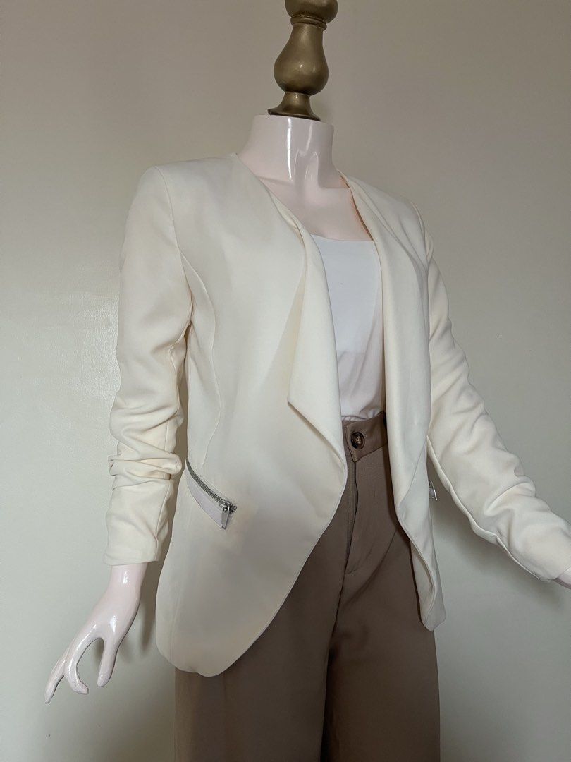 H&M Draped Zip Pocket Blazer - SALE (Category: Coats, Jackets and Outerwear) located in Subic. Submitted by miche.b (Listing ID 1458808266, Image 2). Description: collarless neckline open-front draped silhouette soft structured shoulders curved elongated hem diagonal zippered front pockets silver-tone zipper hardware fully lined interior tailored flattering silhouette smooth woven fabric.
