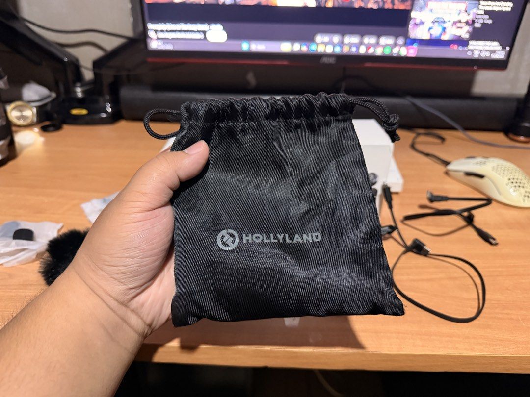 Hollyland Lark M2 Wireless Lavalier Microphone System (Category: Microphones) located in Antipolo. Submitted by arevalojarod (Listing ID 1458868537, Image 3). Description: - Hollyland Lark M2 wireless lavalier microphone system - Includes charging case - Comes with two transmitters - All original accessories included - Delivers crystal-clear audio recording - Handy storage pouch included - Everything you need to start wireless audio recording.