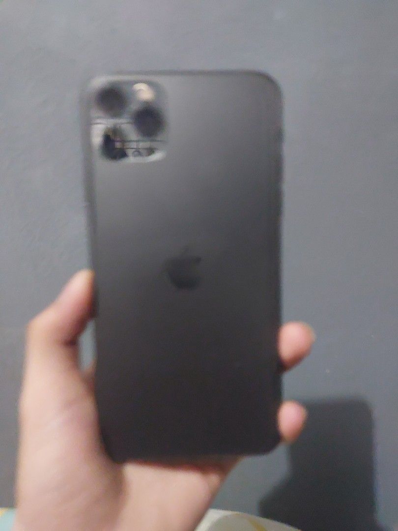 Iphone 11 Pro Max - 64gb (Category: iPhone 11 Series) located in Caloocan City. Submitted by dreiu.cell (Listing ID 1458812245, Image 1). Description: Selling my iPhone 11 Pro Max 64GB. Condition: Body has some scratches/signs of use. Screen has been replaced — not the original display. Battery Health: 74% Fully resettable — can be reset/erased and activated again normally. Phone is working and usable. Selling as-is. Price: ₱9,500 slightly negoti