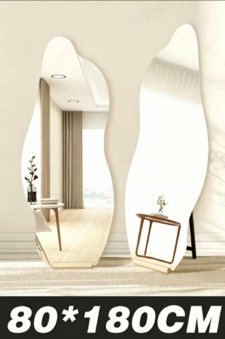 Irregular Shape Full Length Mirror - Lean or Hang (Category: Mirrors) located in Mandaluyong City. Submitted by carmy.94 (Listing ID 1458883944, Image 2). Description: - Unique wavy design, perfect for dressing rooms or decor. - Full-length mirror for complete outfit checks. - Includes a U-shaped foldable stand for easy placement. - Wall-mountable with included space-saving mount (no drilling needed). - Can also be leaned against a wall. - Availa