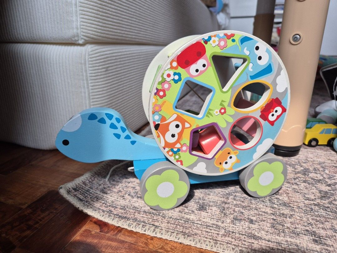 J'Adore Pull Along Turtle (Category: Infant Playtime) located in Paranaque City. Submitted by nik_dc (Listing ID 1458742462, Image 1). Description: missing one shape (oblong) in good used condition payment via gcash shipping c/o buyer.