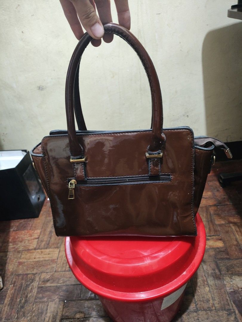 JEMATOZ Brown Crocodile Pattern Satchel Bag with Sling Strap (Category: Luxury Bags & Wallets) located in Manila. Submitted by warmshark.1ae1ea (Listing ID 1458777445, Image 2). Description: ✨ JEMATOZ Satchel Handbag ✨ Brown crocodile pattern design ✨ With adjustable sling strap ✨ Spacious interior with compartments ✨ Good pre-owned condition ✨ Perfect for office, casual, and everyday use RFS: Not using anymore.