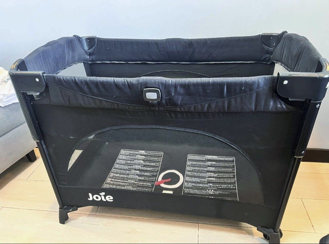 Joie Kubbie Sleep Playpen Crib (Category: Cots & Cribs) located in Taguig. Submitted by prelovedjoys19 (Listing ID 1458768314, Image 3). Description: Joie Kubbie Sleep Playpen Crib - Easy to set-up and fold - Folds compactly and comes with storage bag Color: Black with mesh sides Condition: Used 6 months / With stains on the mattress due to storage Location: Acacia Estates, Taguig .
