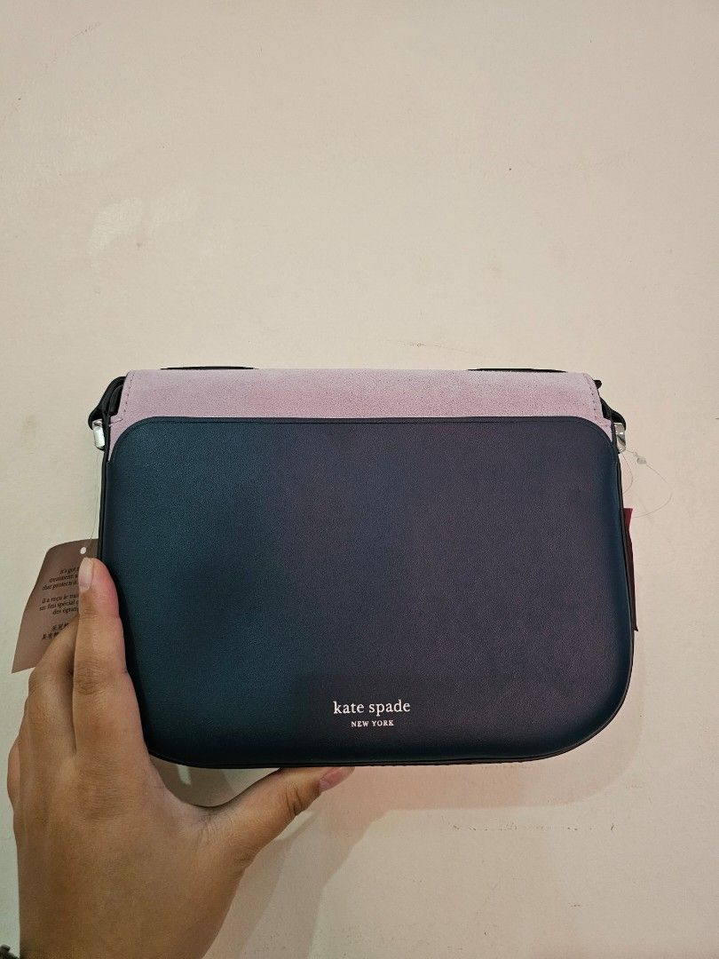 Kate Spade ♠️ Nadine Patchwork Medium Flap Shoulder/Crossbody Bag (Category: Cross-body Bags) located in Manila. Submitted by chobmercado (Listing ID 1458708537, Image 3). Description: BRAND NEW WITH TAGS - Strap included - Cute Kate Spade crossbody bag - Pink and dark blue color panels - Unique curved design - Small gold spade logo on front - Brand new with original tags attached - Versatile for everyday use or nights out.