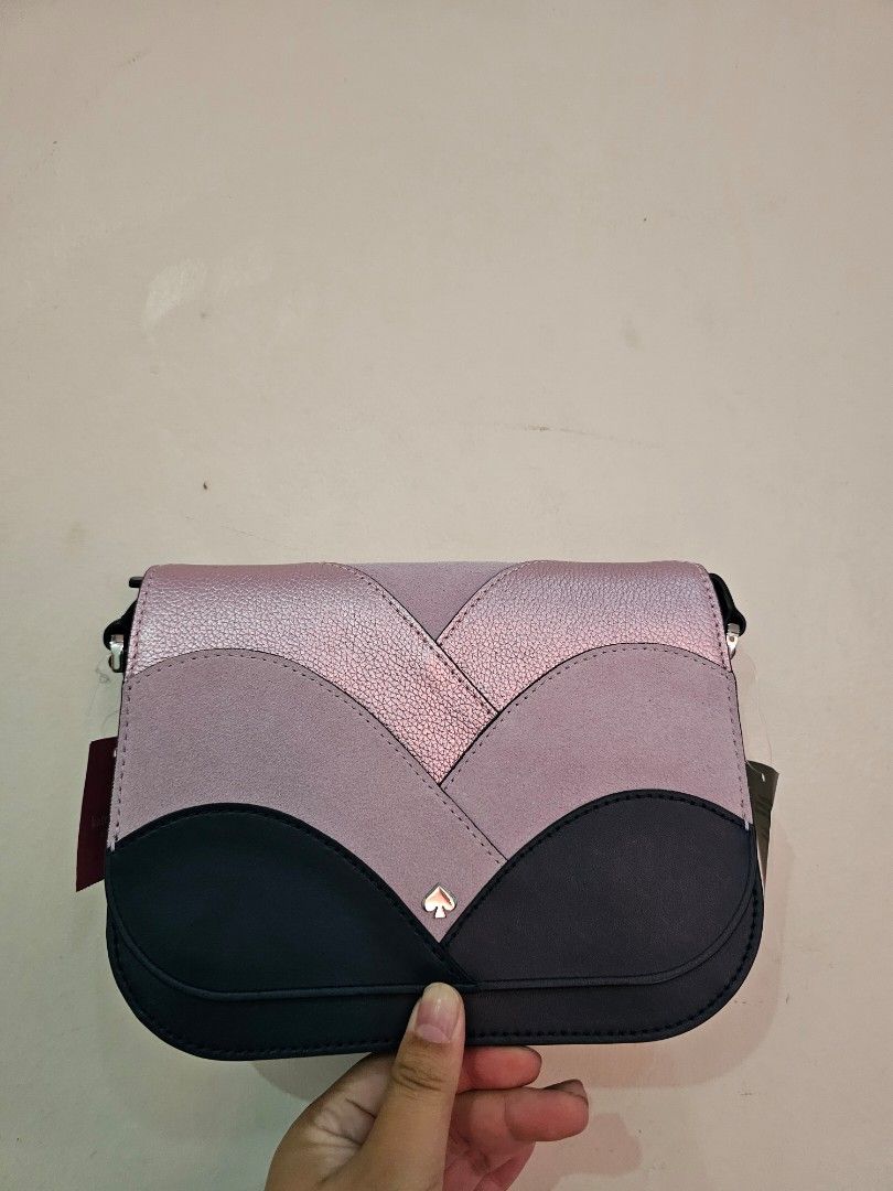 Kate Spade ♠️ Nadine Patchwork Medium Flap Shoulder/Crossbody Bag (Category: Cross-body Bags) located in Manila. Submitted by chobmercado (Listing ID 1458708537, Image 1). Description: BRAND NEW WITH TAGS - Strap included - Cute Kate Spade crossbody bag - Pink and dark blue color panels - Unique curved design - Small gold spade logo on front - Brand new with original tags attached - Versatile for everyday use or nights out.