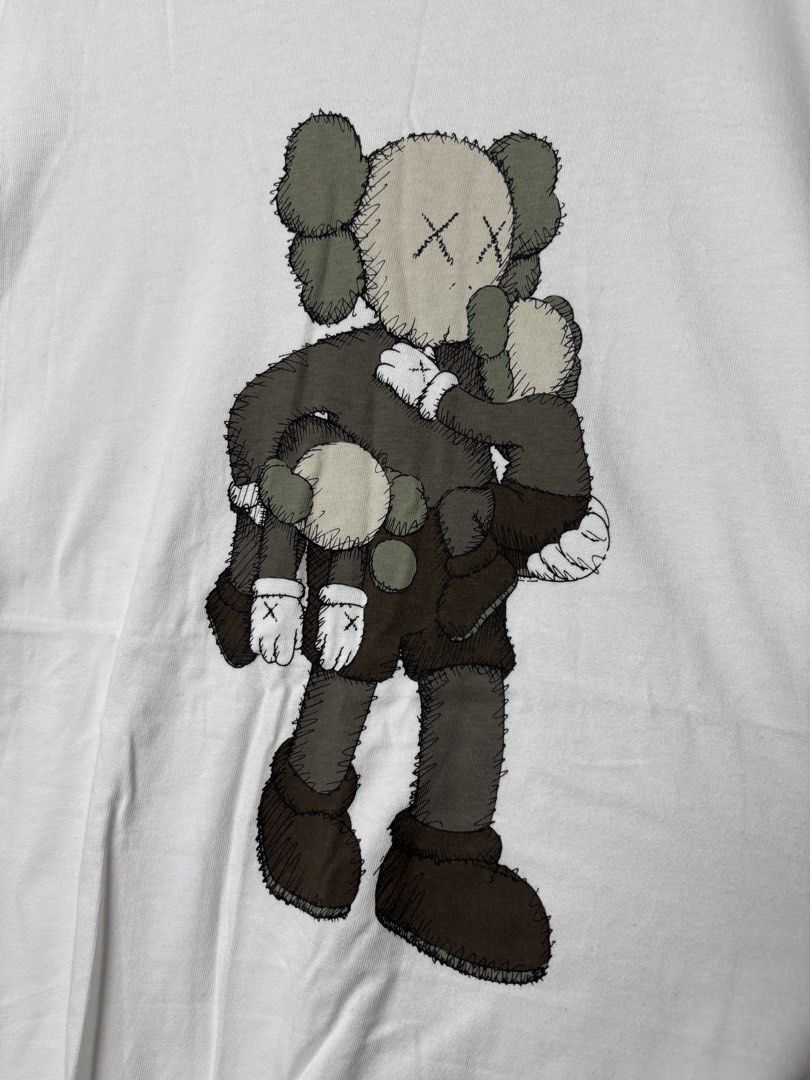Kaws x Uniqlo T-Shirt (Category: Tshirts & Polo Shirts ) located in Mandaluyong City. Submitted by fellas_ph (Listing ID 1458809527, Image 2). Description: Excellent condition No issues Size L, fits M 20" Width 28.5" Length.