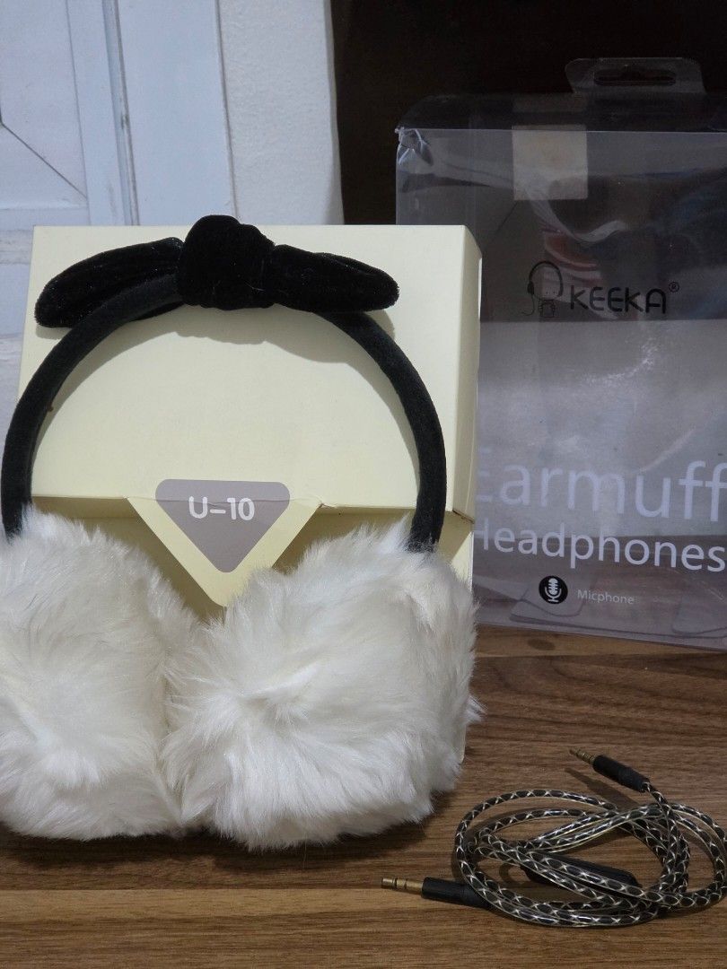 KEEKA U-10 Earmuff Headphones with Microphone (Category: Headphones & Headsets) located in Caloocan City. Submitted by bravemountain_ddc4bf (Listing ID 1458840761, Image 2). Description: - Cute white fluffy earmuffs with a black bow - KEEKA U-10 earmuff headphones - Built-in microphone - Adjustable headband for a comfortable fit - Comes with a cord - Ideal for staying warm and enjoying music.