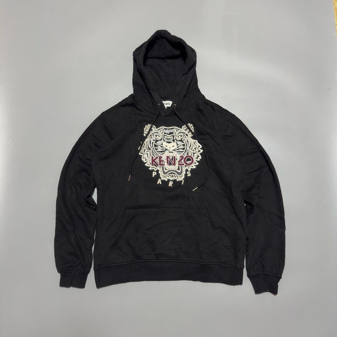 Kenzo Black Classic Gold/Brown Tiger Pullover Hood (Category: Luxury Apparel) located in Alburquerque. Submitted by getniceph2022 (Listing ID 1458741208, Image 1). Description: Kenzo Black Classic Gold/Brown Tiger Pullover Hood - Size small Measurements: 21 inch width. 26 inch length. Excellent condition!.