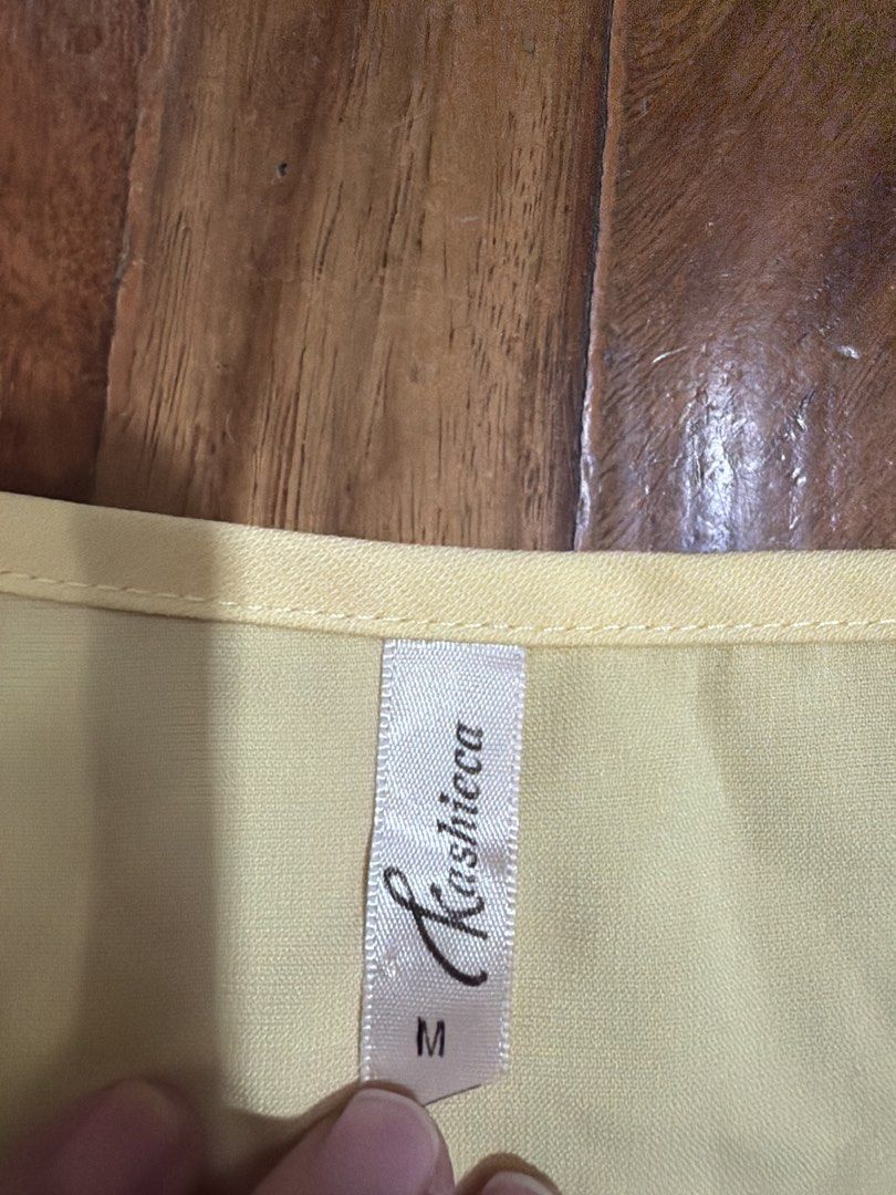 Keshieca Lace Overlay Top Size M (Category: Blouses) located in Quezon City. Submitted by bagoffinds (Listing ID 1458785063, Image 2). Description: - Lovely light yellow top - Delicate white lace overlay - Comfortable short sleeves - Measurements: 16" chest, 25" length - Versatile for casual or dressed-up looks.