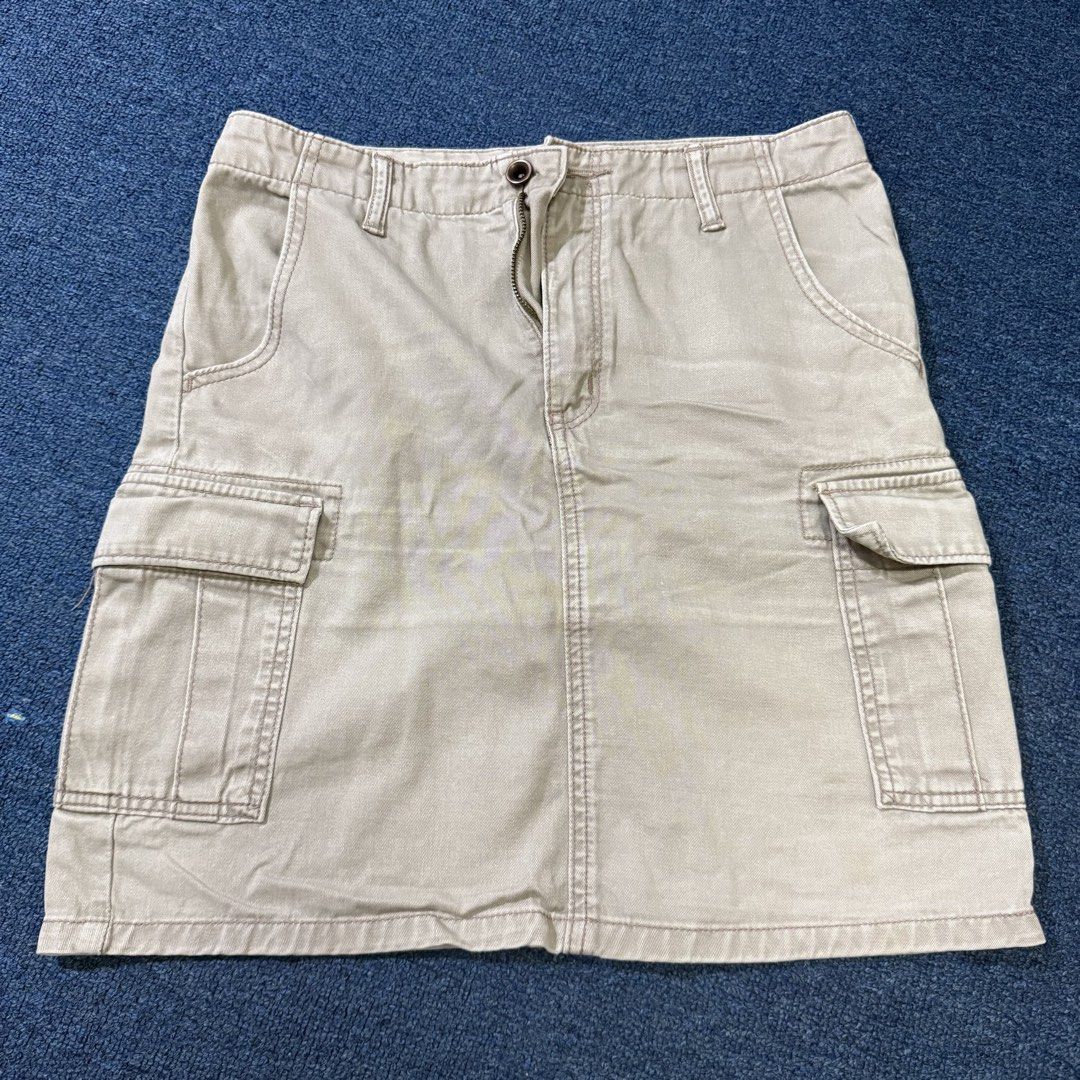 Khaki Cargo Mini Skirt (Category: Skirts) located in Quezon City. Submitted by kayelene (Listing ID 1458797088, Image 1). Description: - Khaki cargo mini skirt - Classic A-line cut - Multiple pockets for storage (front and back) - Zipper and button front closure - Ideal for casual wear.