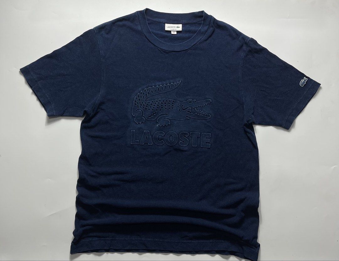 LACOSTE BIGLOGO EMBOSED DENIM DESIGN (Category: Tshirts & Polo Shirts ) located in Manila. Submitted by 5kcollectiveph (Listing ID 1458779984, Image 1). Description: LACOSTE BIG LOGO UNCOMMON DESIGN -Color: Navy Washdenim -Size Medium -Width: 21.5 -Length: 29 -Color rate: 9.5”10 -Like new.