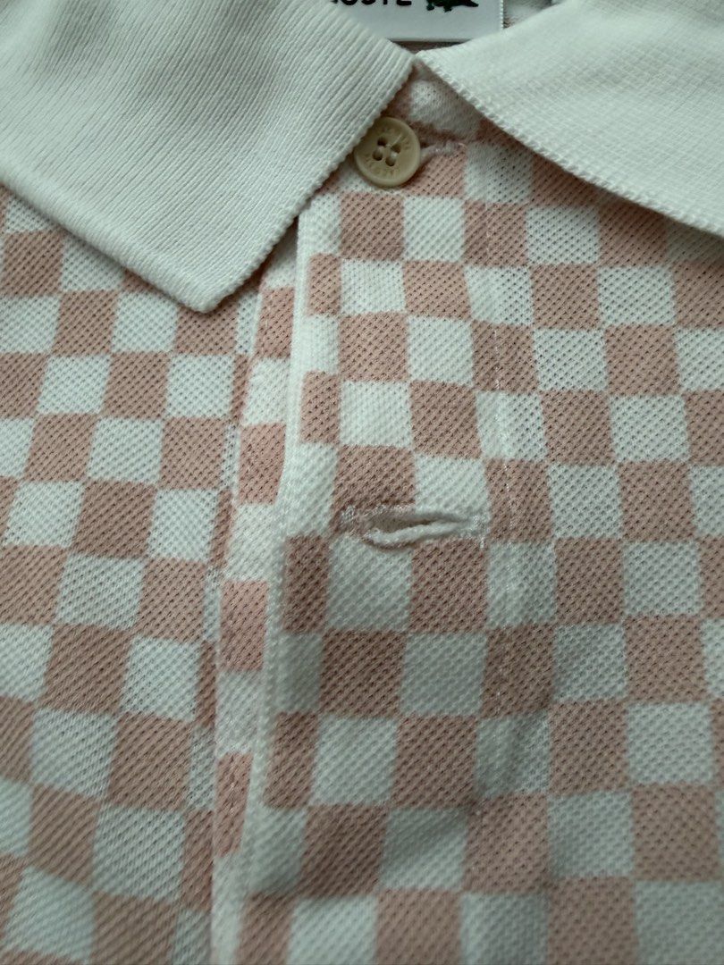 Lacoste Polo (Category: Babies & Kids Fashion) located in Pasig City. Submitted by fancytracy (Listing ID 1458707558, Image 3). Description: Authentic Size 12 Used Twice Issue: Size tag was removed kaya nagka hole. Wash tag also removed. Nangangati kasi pag na poke un skin while worn. .