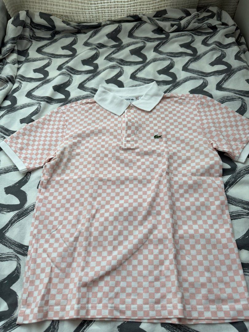 Lacoste Polo (Category: Babies & Kids Fashion) located in Pasig City. Submitted by fancytracy (Listing ID 1458707558, Image 1). Description: Authentic Size 12 Used Twice Issue: Size tag was removed kaya nagka hole. Wash tag also removed. Nangangati kasi pag na poke un skin while worn. .