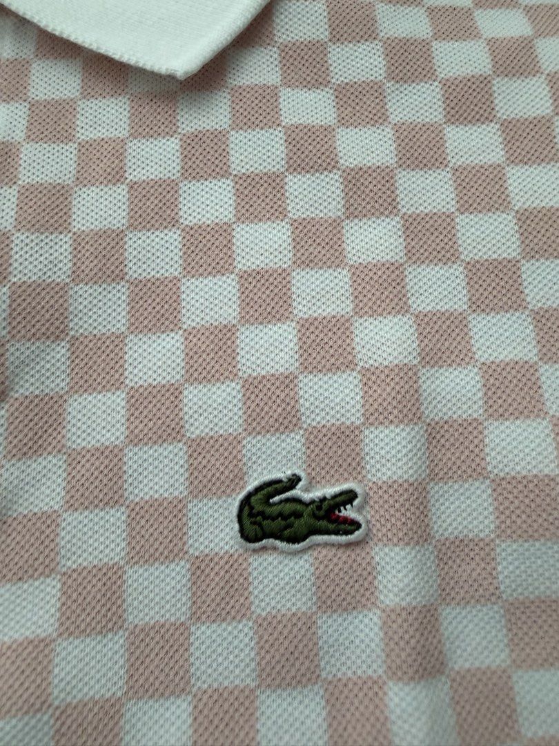 Lacoste Polo (Category: Babies & Kids Fashion) located in Pasig City. Submitted by fancytracy (Listing ID 1458707558, Image 2). Description: Authentic Size 12 Used Twice Issue: Size tag was removed kaya nagka hole. Wash tag also removed. Nangangati kasi pag na poke un skin while worn. .