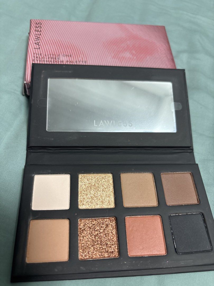 Lawless The Little One Eyeshadow Palette (Category: Makeup) located in Taguig. Submitted by sisidlanmanila (Listing ID 1458700648, Image 2). Description: - Lawless The Little One Eyeshadow Palette - Talc-free formula - 8 versatile shades - Built-in mirror - Ideal for everyday looks and travel - Compact and portable design From US Sephora.