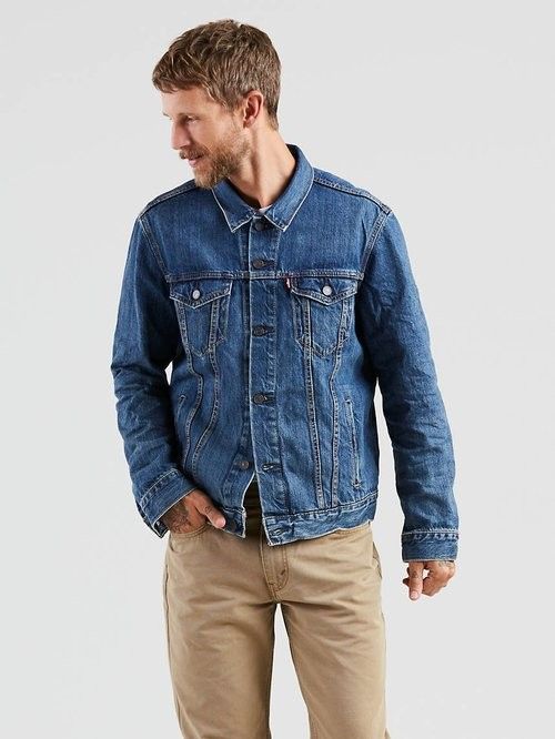 Levi's Trucker Denim Jacket - Classic Blue (Category: Coats, Jackets and Outerwear) located in Angeles City. Submitted by pkthreadz (Listing ID 1458736304, Image 2). Description: - Classic Levi's denim jacket - Medium blue wash - Button front closure - Two chest pockets with button flaps - Side pockets - Standard fit - Ideal for layering or wearing alone - Versatile wardrobe staple - Issue slight fade on collar - 19x25 dimes.