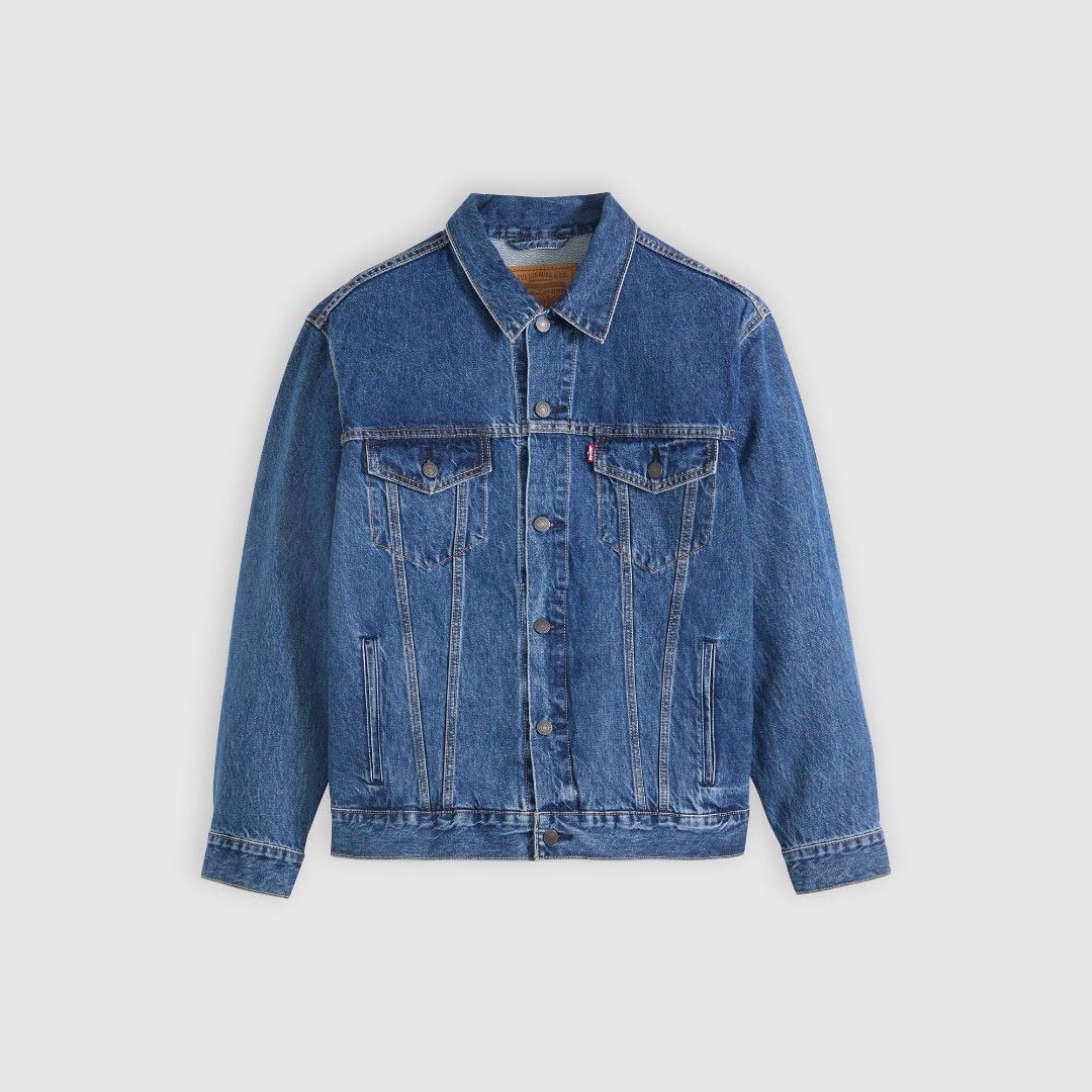 Levi's Trucker Denim Jacket - Classic Blue (Category: Coats, Jackets and Outerwear) located in Angeles City. Submitted by pkthreadz (Listing ID 1458736304, Image 1). Description: - Classic Levi's denim jacket - Medium blue wash - Button front closure - Two chest pockets with button flaps - Side pockets - Standard fit - Ideal for layering or wearing alone - Versatile wardrobe staple - Issue slight fade on collar - 19x25 dimes.