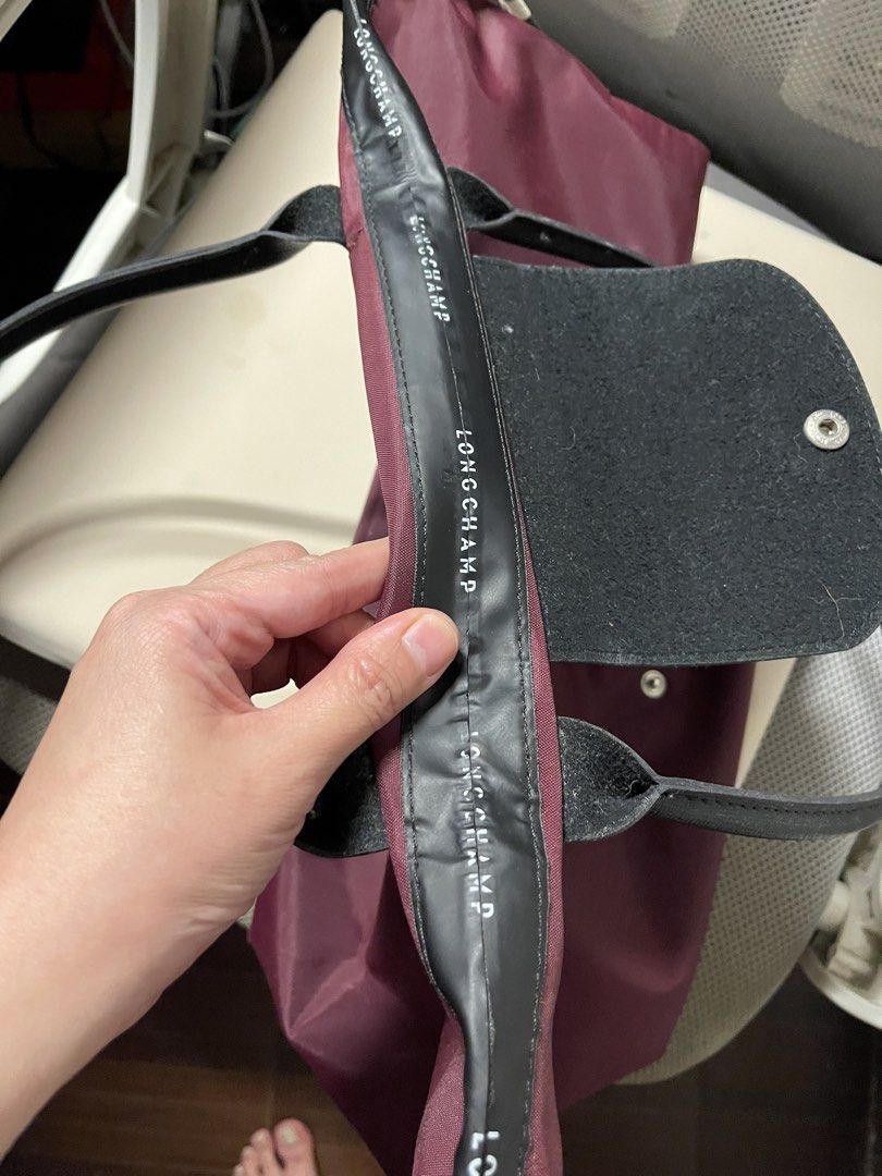 Longchamp Le Pliage Tote Bag Burgundy (Category: Luxury Bags & Wallets) located in Pasig City. Submitted by naturalees (Listing ID 1458746594, Image 3). Description: - Classic Longchamp tote bag - Color: Burgundy nylon with black leather trim and handles - Features: Folds flat for easy storage, interior pocket - Ideal for: Everyday use, work, or travel - Condition: Shows some signs of wear, but plenty of life left.