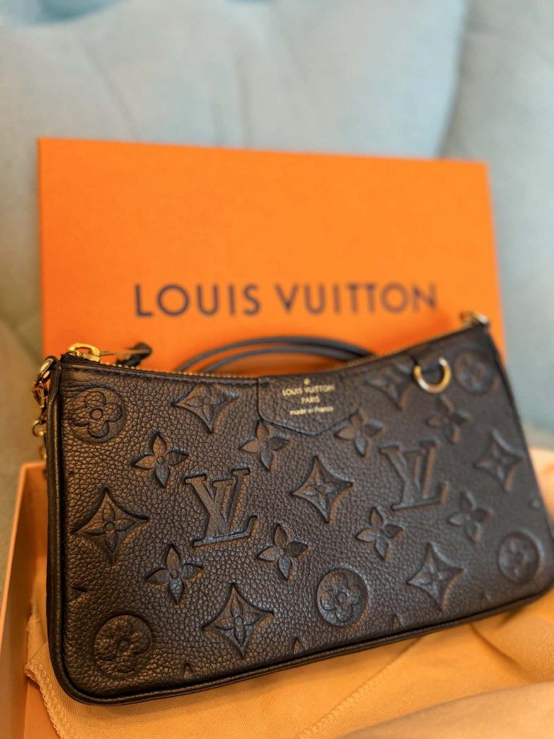Louis Vuitton Black Monogram Empreinte Pochette (Category: Luxury Bags & Wallets) located in Manila. Submitted by janeca__ (Listing ID 1458763887, Image 1). Description: - Authentic Louis Vuitton Pochette - Color: Black - Material: Empreinte Leather - Features: Embossed Monogram Pattern - Versatile: Detachable leather strap and gold chain for clutch or shoulder bag - Includes: Original Louis Vuitton Box COMPLETE SET For inquiries kindly message m