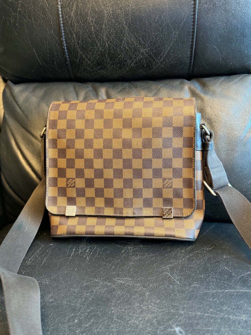 Louis Vuitton Damier Ebene Canvas Messenger Bag (Category: Luxury Bags & Wallets) located in Manila. Submitted by janeca__ (Listing ID 1458764008, Image 1). Description: - Authentic Louis Vuitton messenger bag - Classic Damier Ebene canvas - Adjustable shoulder strap - Secure flap closure - Perfect for daily use - Shows minor signs of wear on strap and corners.