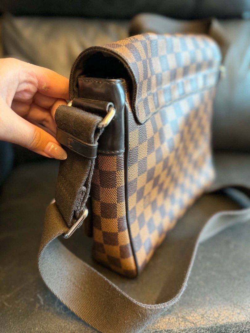 Louis Vuitton Damier Ebene Canvas Messenger Bag (Category: Luxury Bags & Wallets) located in Manila. Submitted by janeca__ (Listing ID 1458764008, Image 3). Description: - Authentic Louis Vuitton messenger bag - Classic Damier Ebene canvas - Adjustable shoulder strap - Secure flap closure - Perfect for daily use - Shows minor signs of wear on strap and corners.