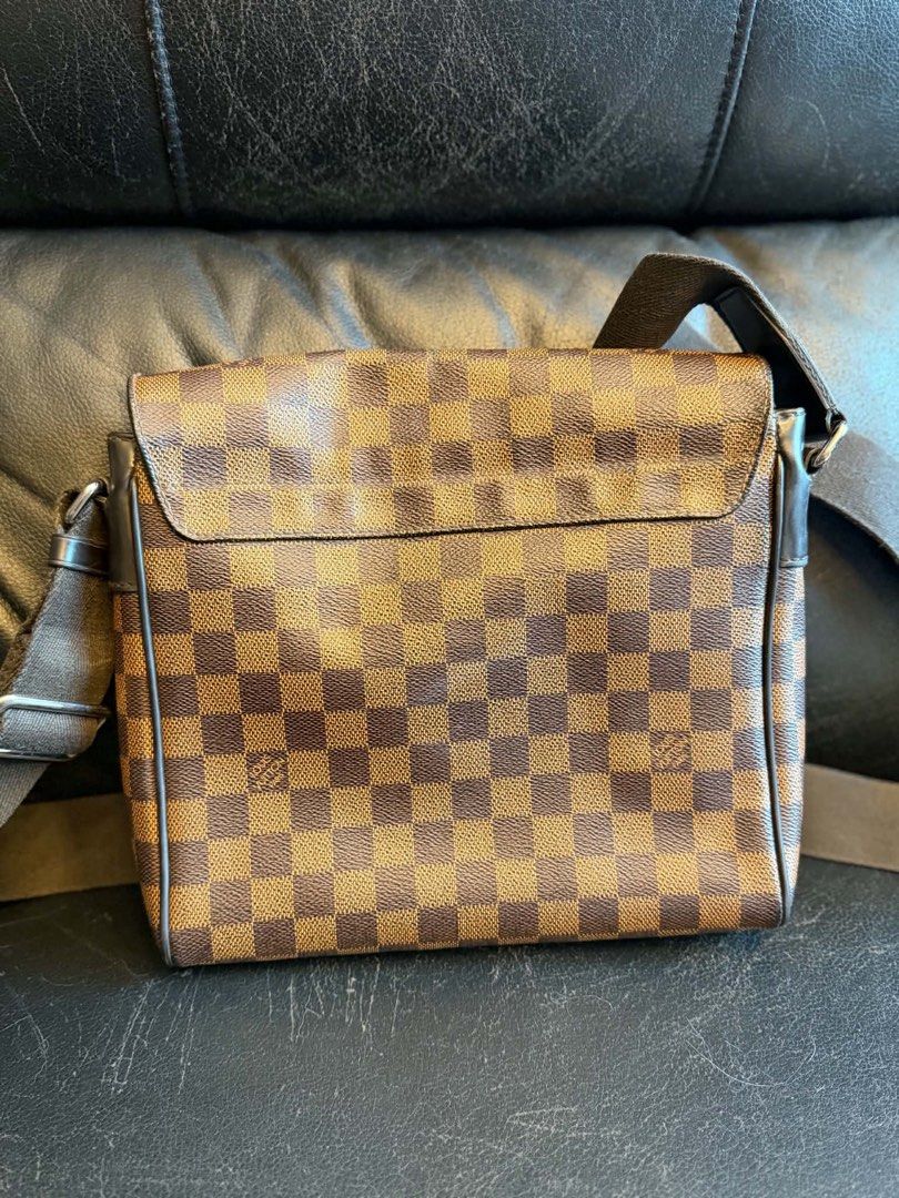 Louis Vuitton Damier Ebene Canvas Messenger Bag (Category: Luxury Bags & Wallets) located in Manila. Submitted by janeca__ (Listing ID 1458764008, Image 2). Description: - Authentic Louis Vuitton messenger bag - Classic Damier Ebene canvas - Adjustable shoulder strap - Secure flap closure - Perfect for daily use - Shows minor signs of wear on strap and corners.