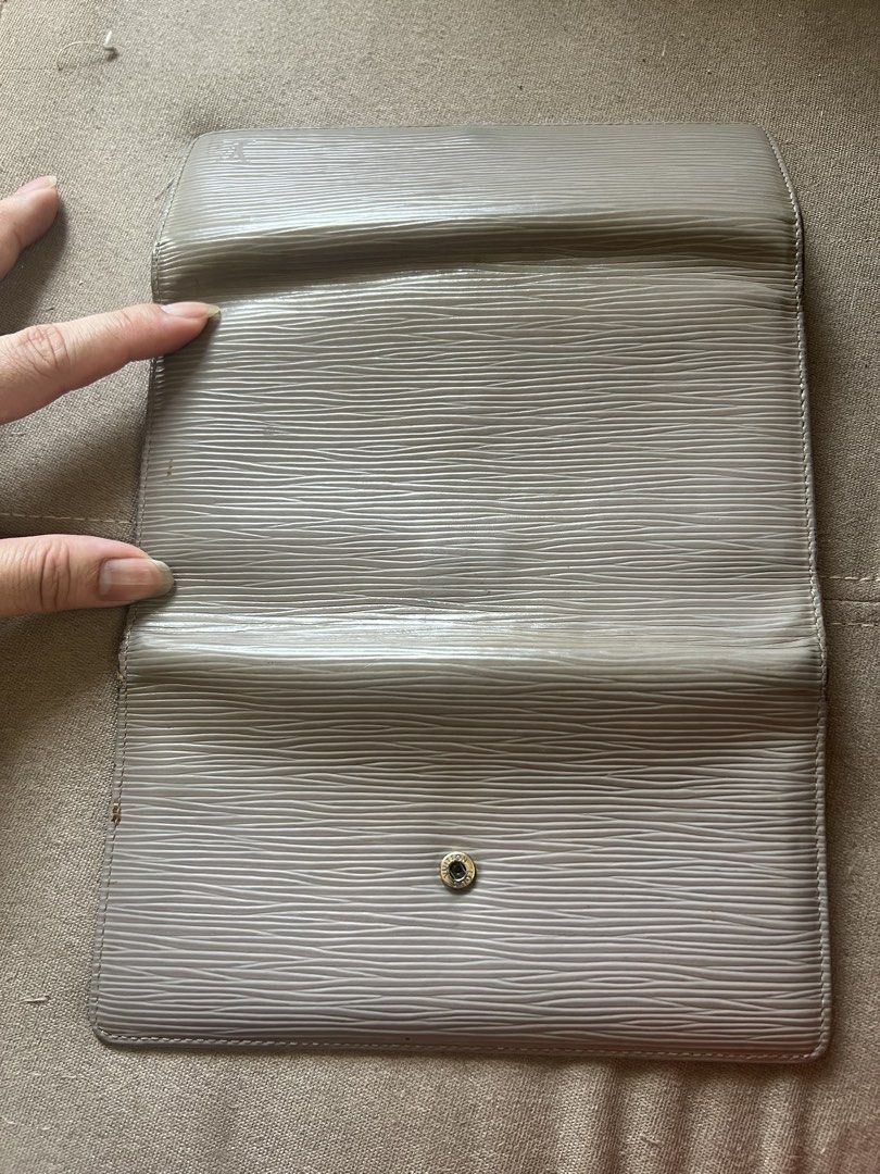 Louis Vuitton Epi Leather Long Wallet Grey (Category: Luxury Bags & Wallets) located in Santa Rosa. Submitted by pepperchill (Listing ID 1458708970, Image 3). Description: - Authentic Grey Louis Vuitton Wallet - Durable Epi Leather - Ample Card Slots and Compartments - Secure Snap Closure - Fully functional and chic accessory.