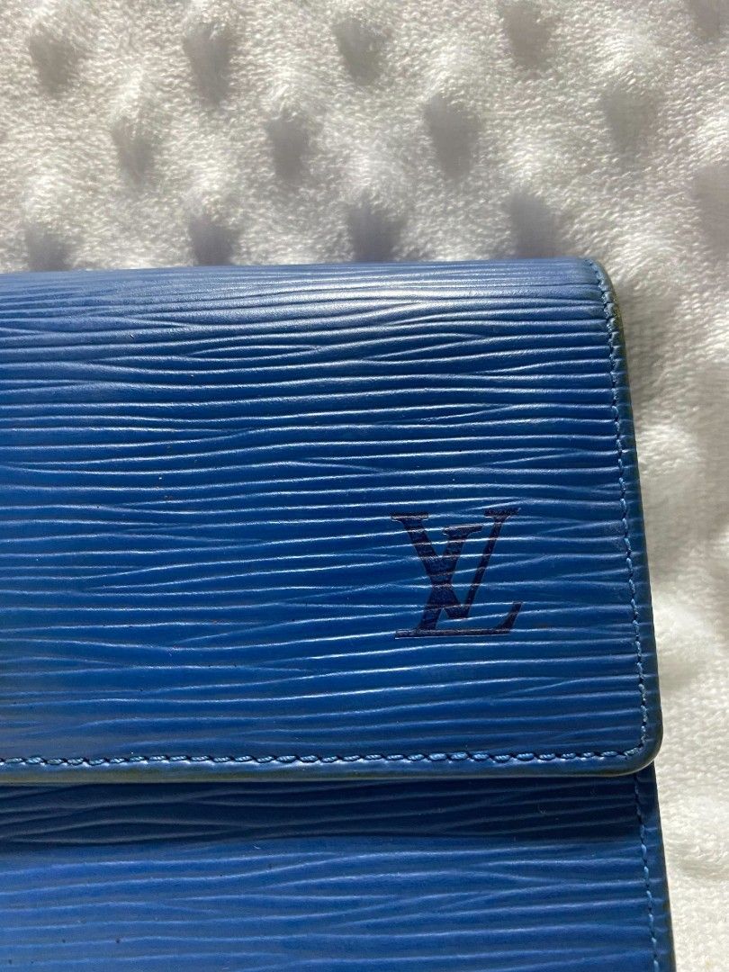 Louis Vuitton Epi Leather Wallet Blue (Category: Luxury Bags & Wallets) located in Tanay. Submitted by micvalcorza (Listing ID 1458822647, Image 2). Description: - Authentic Louis Vuitton Wallet - Blue Epi Leather - Snap Closure - Multiple Card Slots & Compartments - Made in France - Serial Number: SP0928 - Perfect for organizing essentials - Signs Of Used posted sa Black Part Bakbak Still Wearable - 2250 Plus Ship.